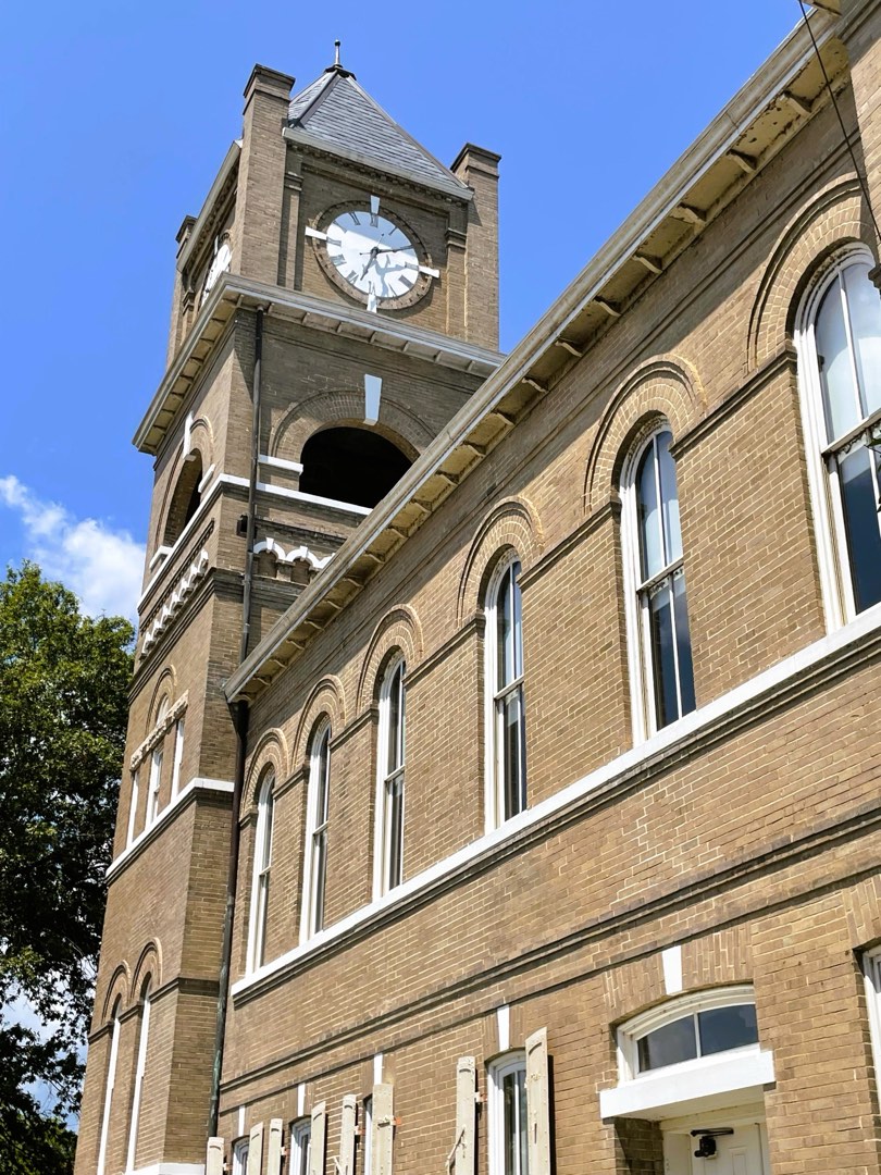 exterior of a building with a clock tower